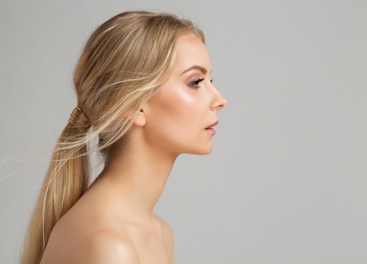 Woman's side profile with a smooth nose