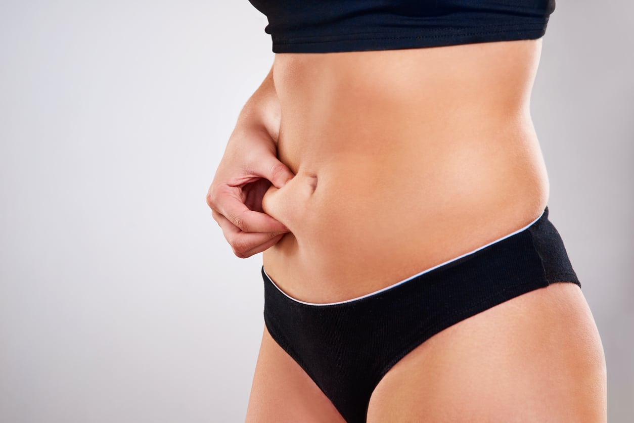 Woman considering body contouring surgery.