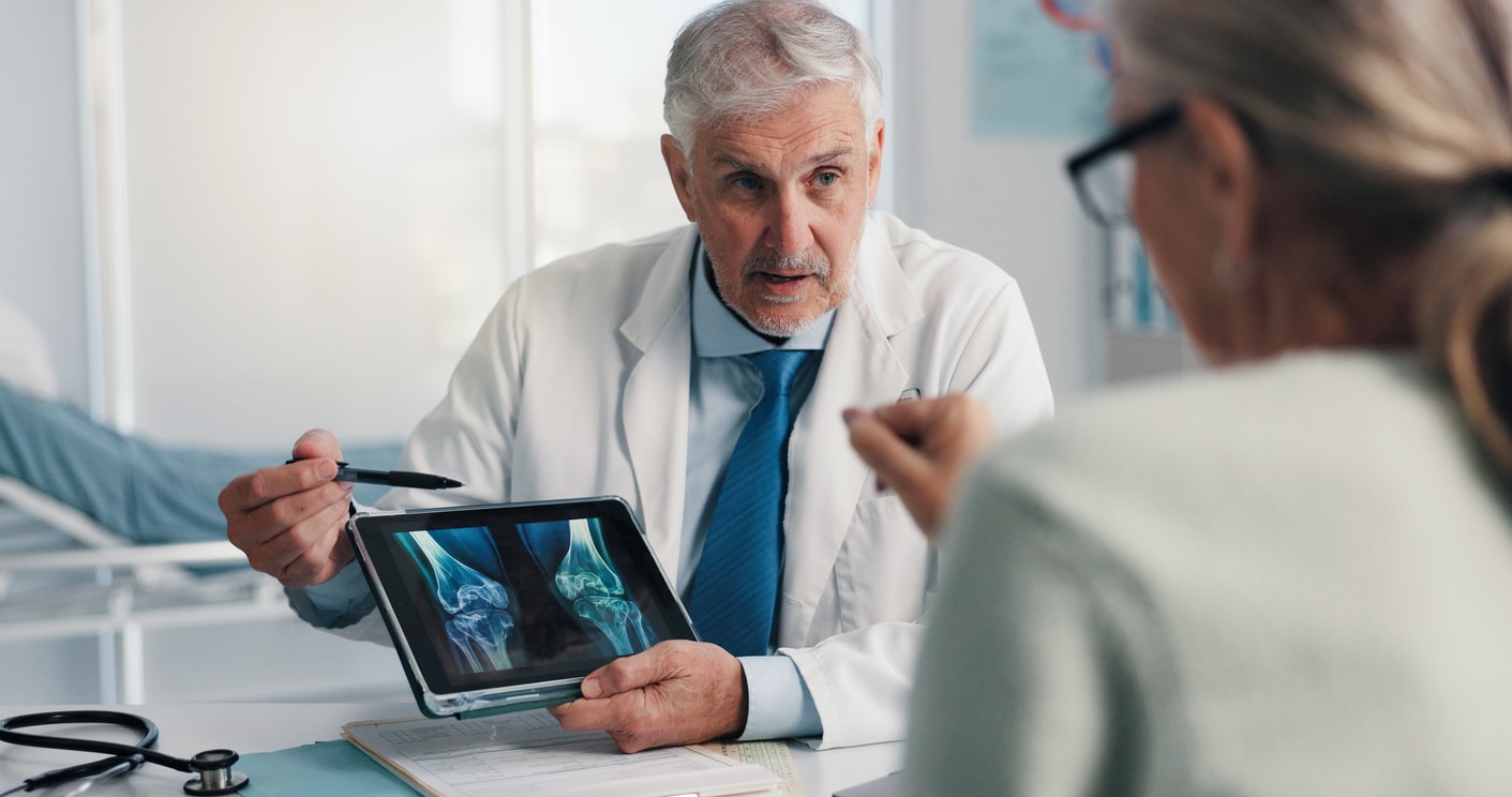 Doctor discussing Mohs reconstruction options